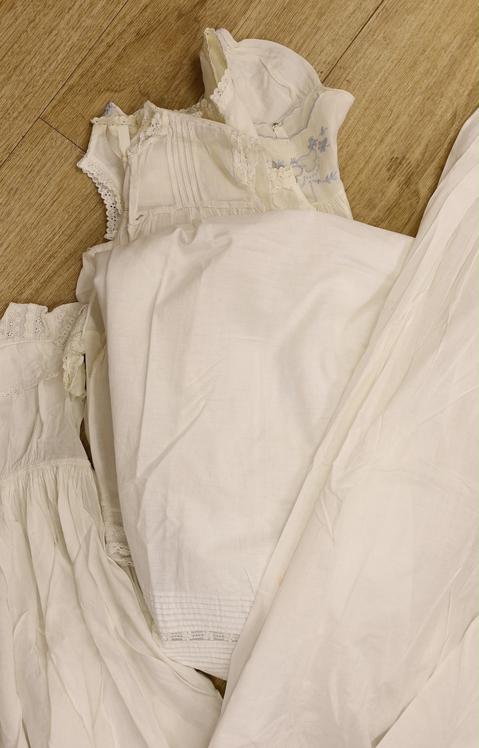 A 19th century Scottish Ayrshire, hand white worked christening gown and a similar baby dress, together with a collection of other 19 th century baby wear.